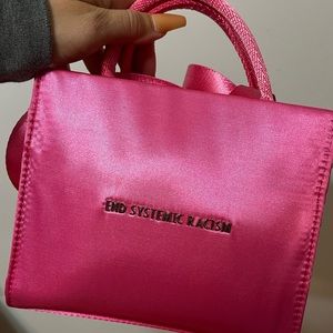 Brandon Blackwood’s “END SYSTEMATIC RACISIM” bag
